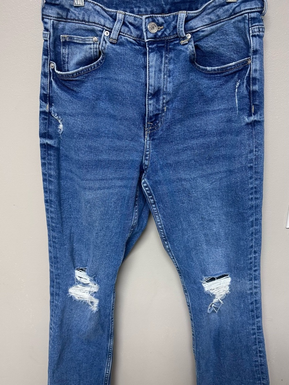 Distressed Blue Denim Jeans